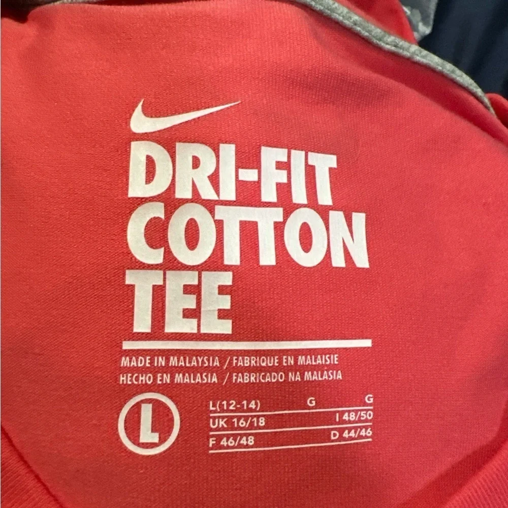 Nike Women’s Coral DRI-FIT Tee with Graphic Design